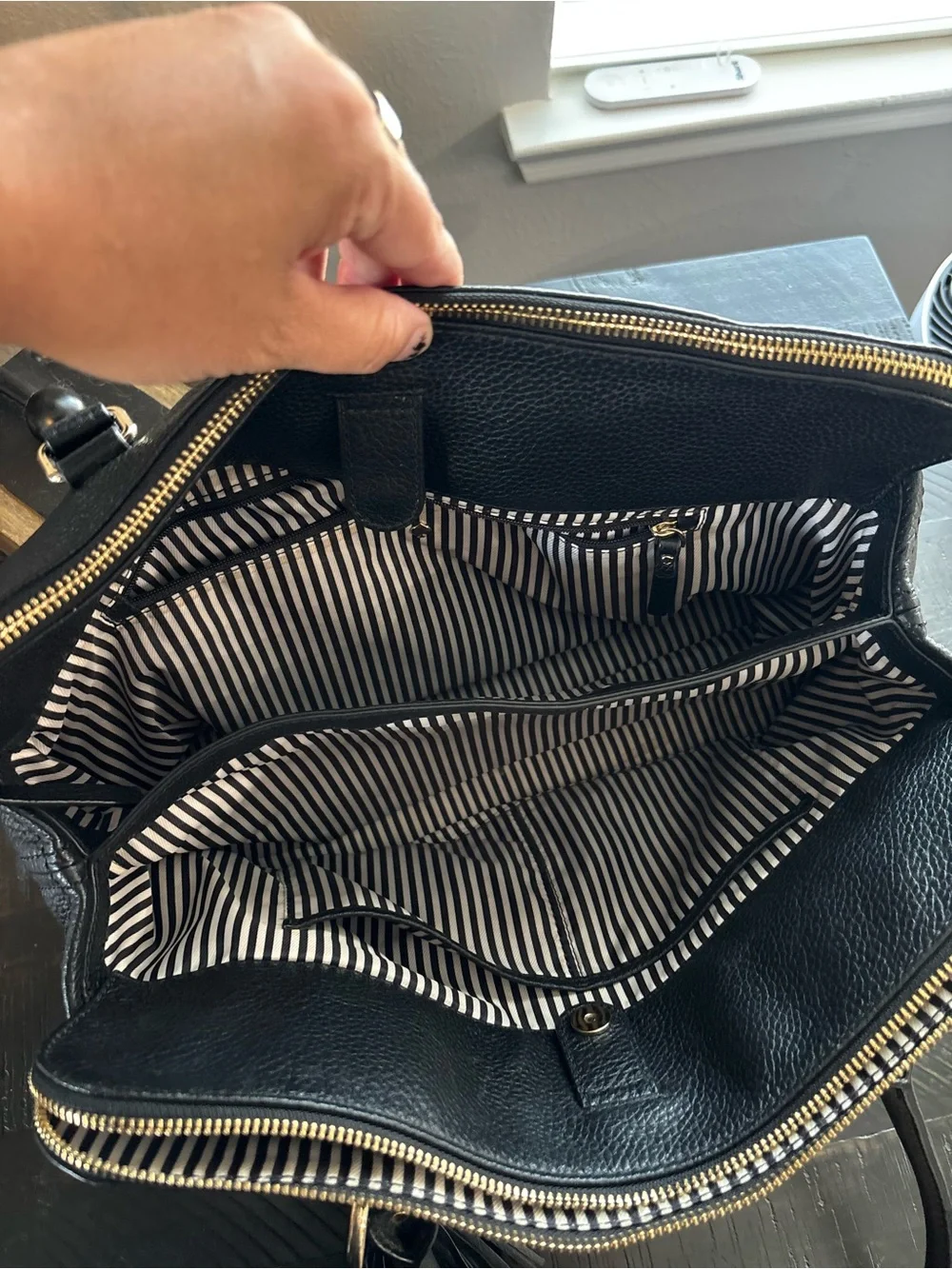 kate spade Black Pebbled Leather Tote with Tassel and Gold Hardware